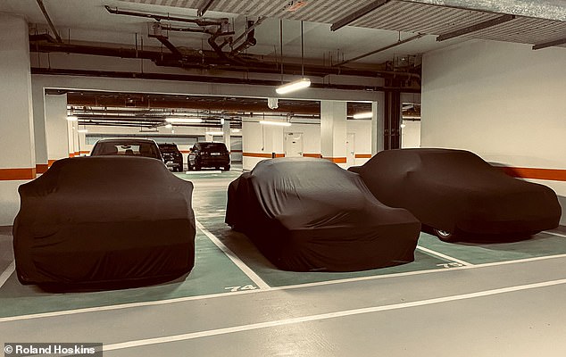 Luxury cars have been abandoned and left underneath dust covers, presumably while their owners seek shelter elsewhere